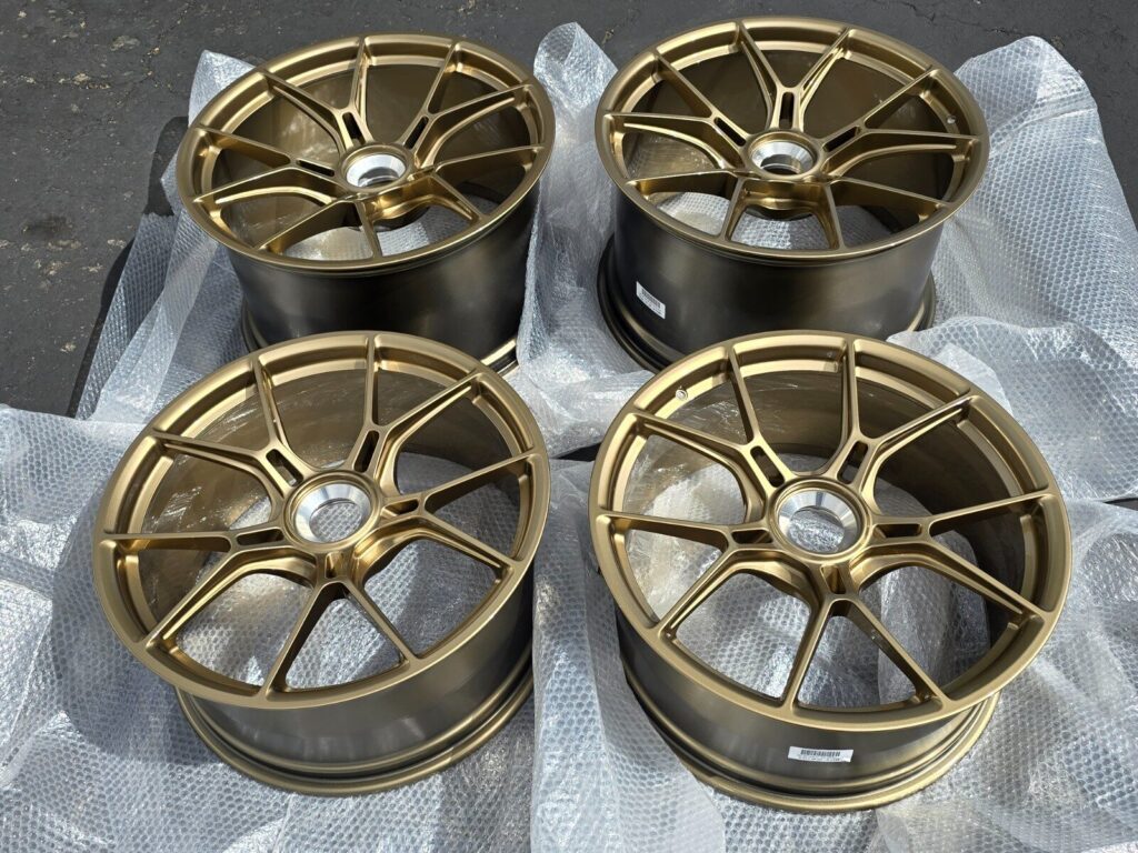 20/21" Porsche 992.2 GT3 Center lock OEM factory Saturn Gold wheels 992